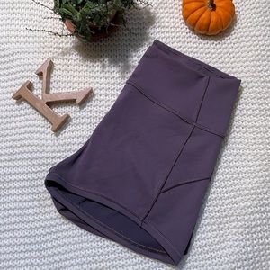 Size 8 lululemon spandex shorts. A purple grey color